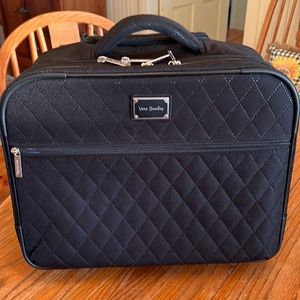 Vera Bradley rolling carry on bag.